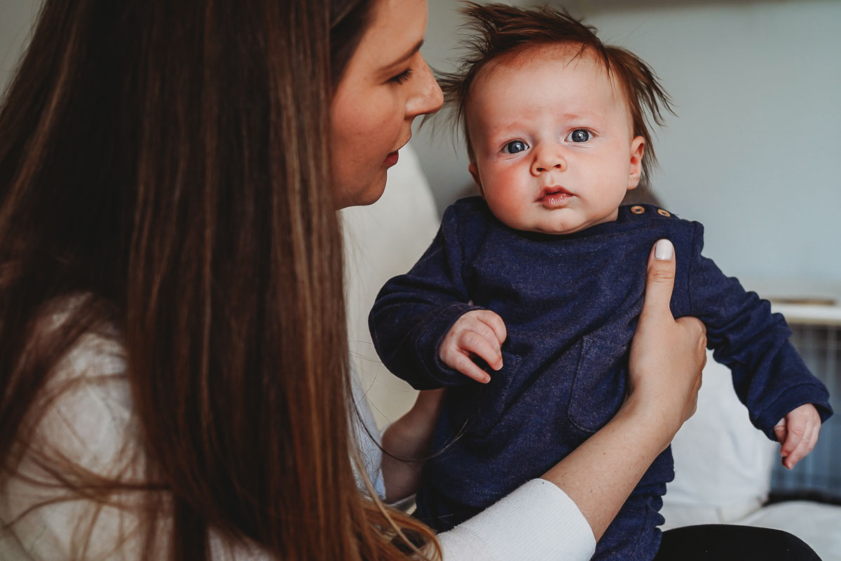 newborn baby looking as the camera for a Newbury photographer