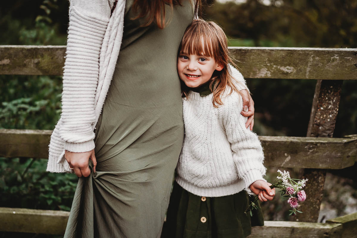 mother and daughter hugging for a family photographer in oxford