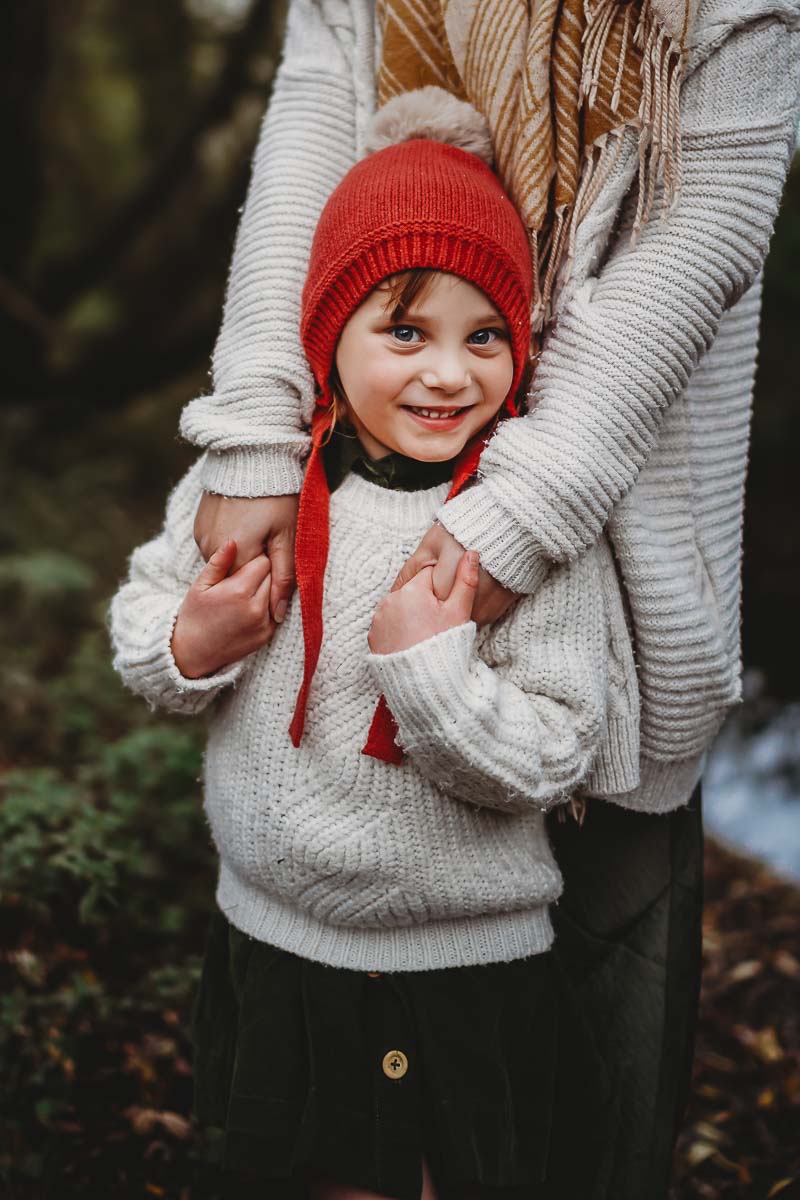 a mum and daughter hugging for a family photoshoot in oxford