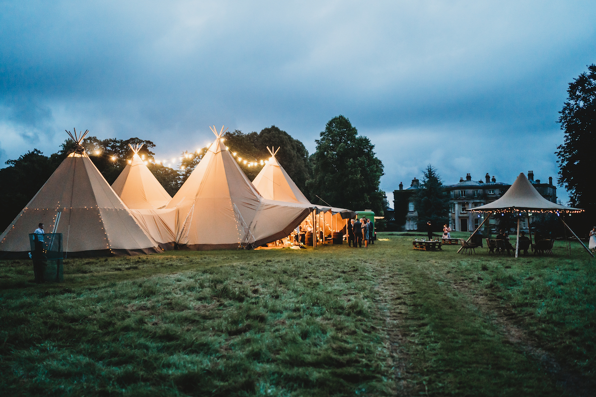 a photo of the wedding tipis after sunset taken by a Newbury wedding photographer