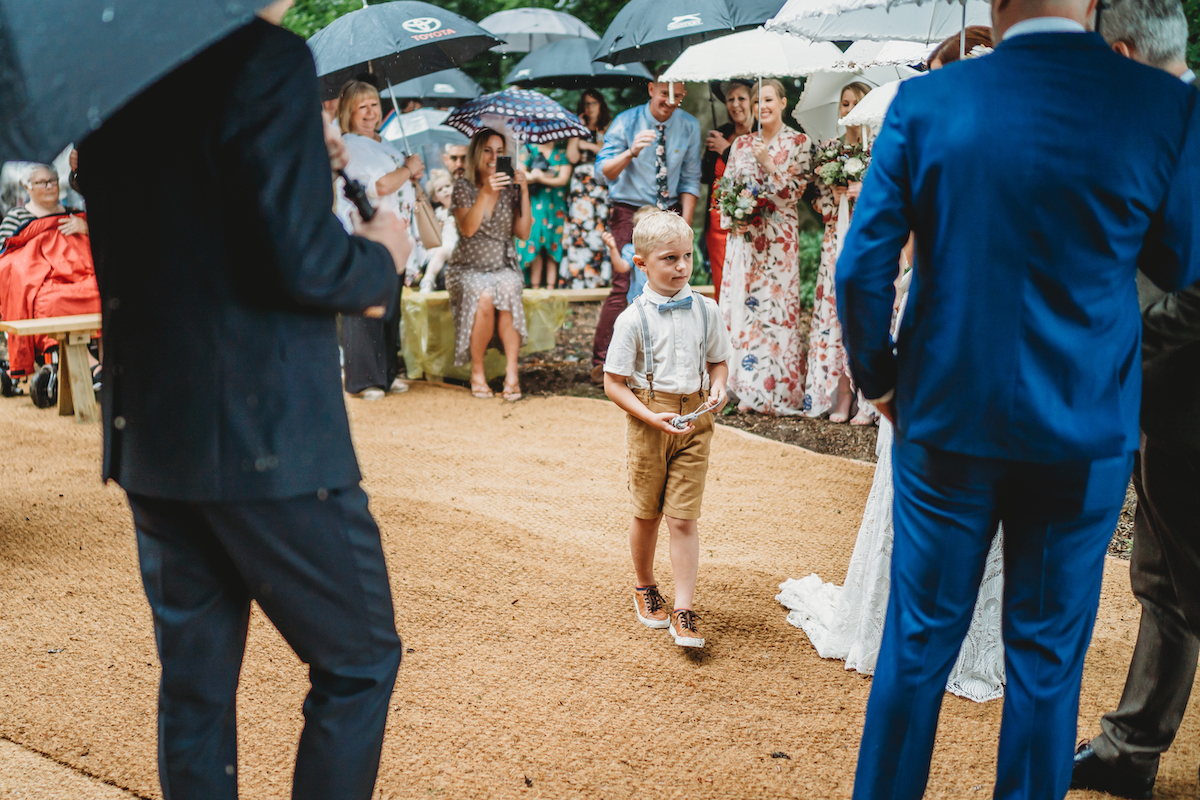 a ring bearer delivering the rings during a ceremony