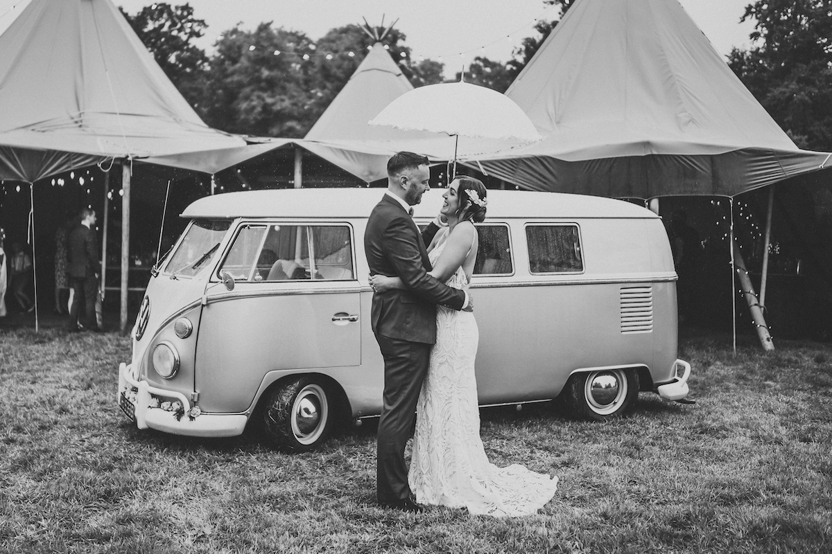 newly weds laughing together during their couples photographs