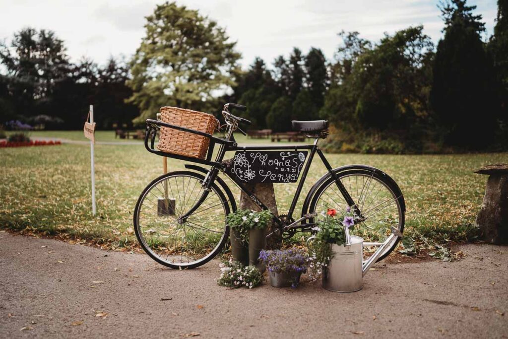 A bike used as the wedding sign at a Barn wedding venues in Berkshire 