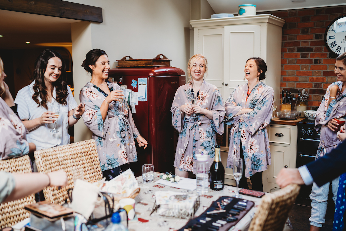 bridal party laughing before a wedding in Berkshire