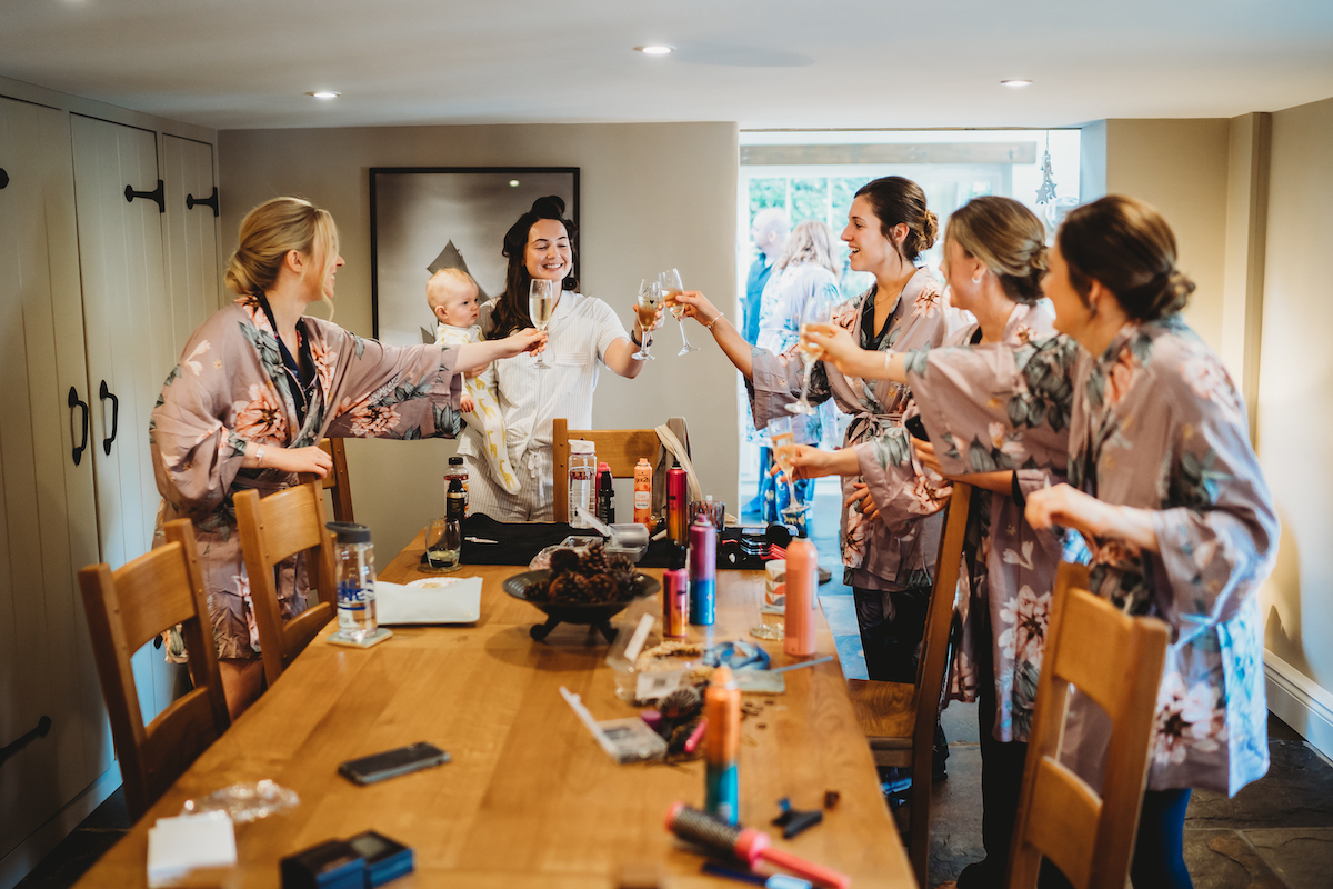 bridesmaids saying cheers before a wedding in Newbury