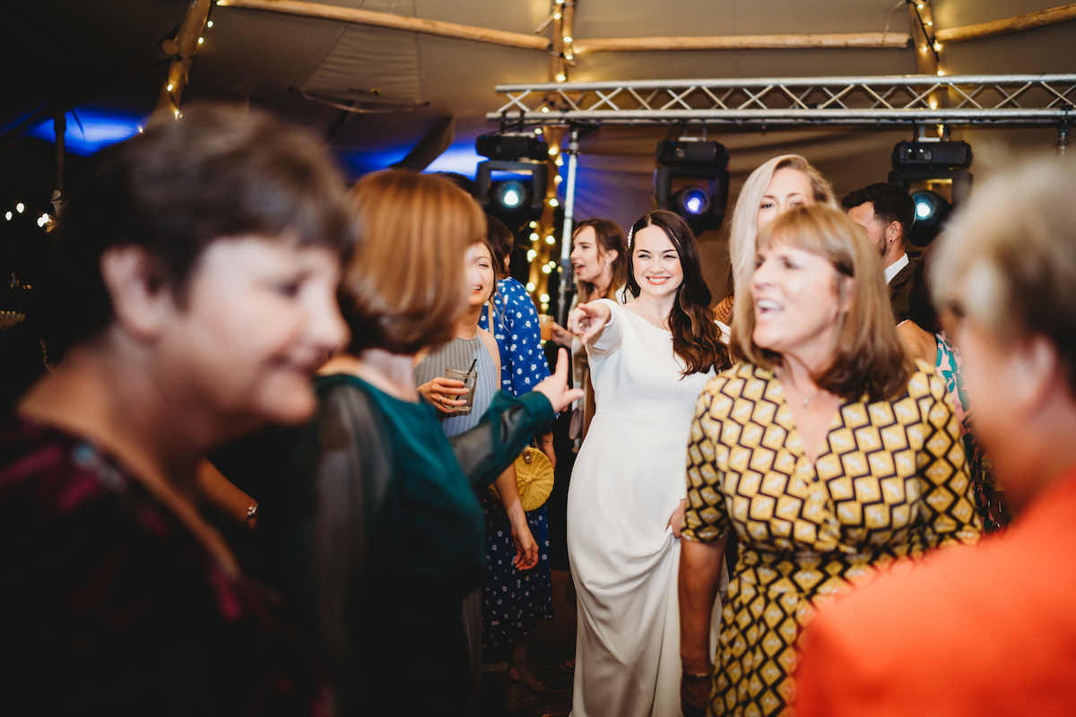 a Newbury wedding photographer capturing the bride on the dance floor