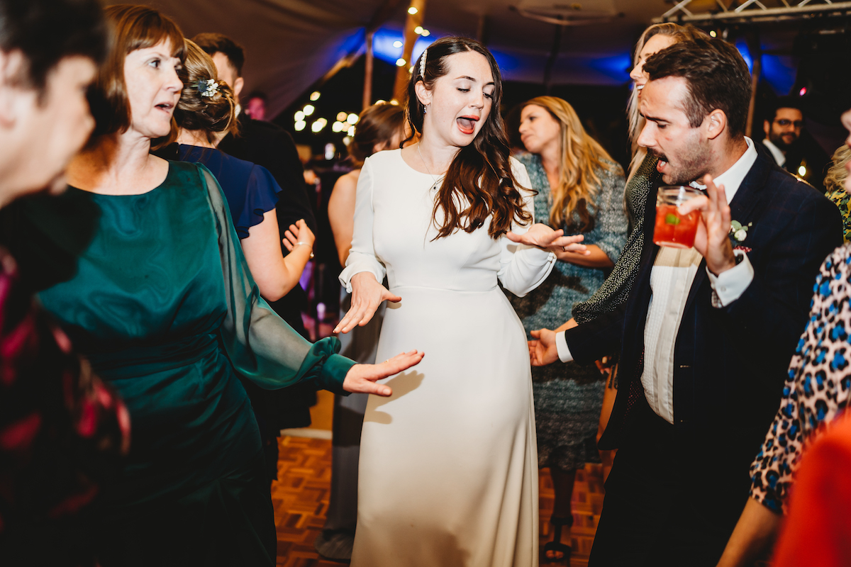 bride mid dance on the dance floor