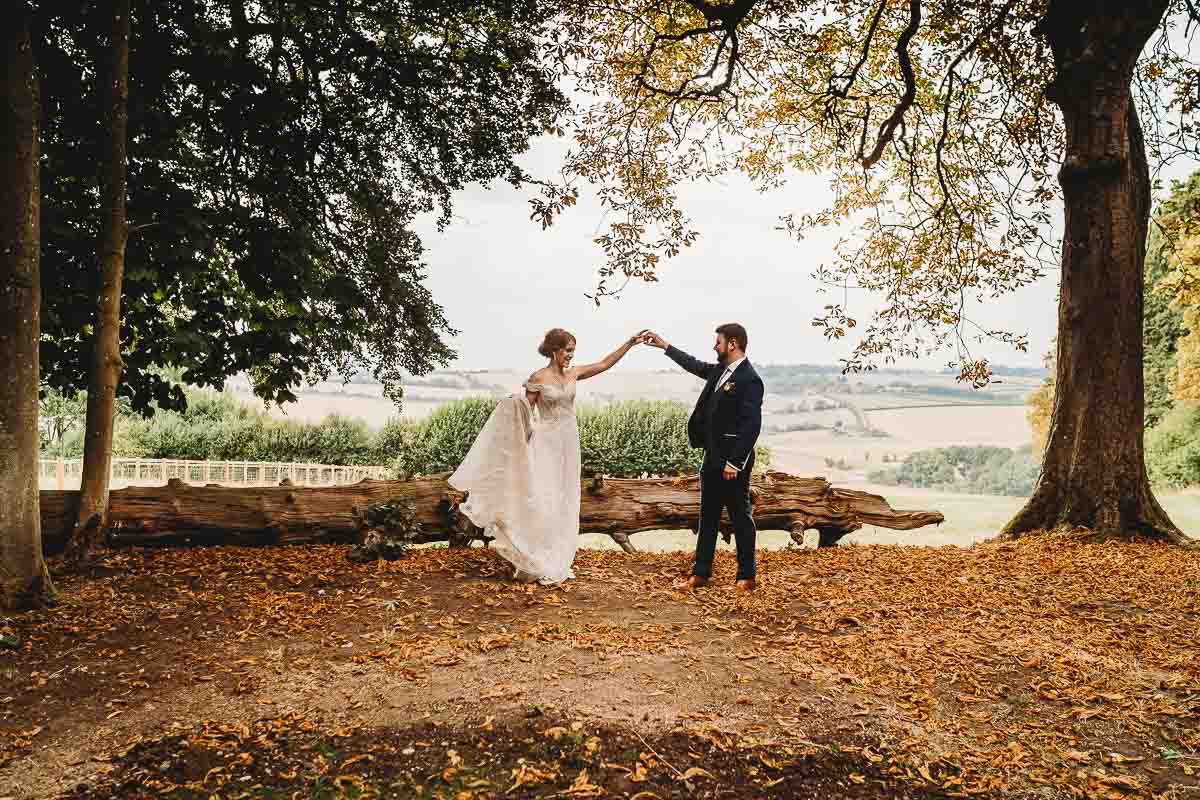 a bride and groom dancing in the woodland after their Forest Edge tipi wedding