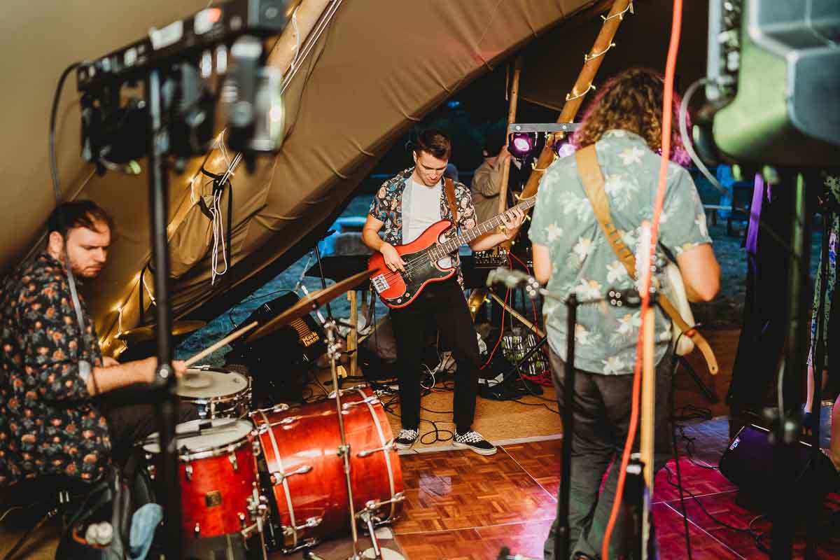 a band playing for a wedding during a berkshire tipi wedding