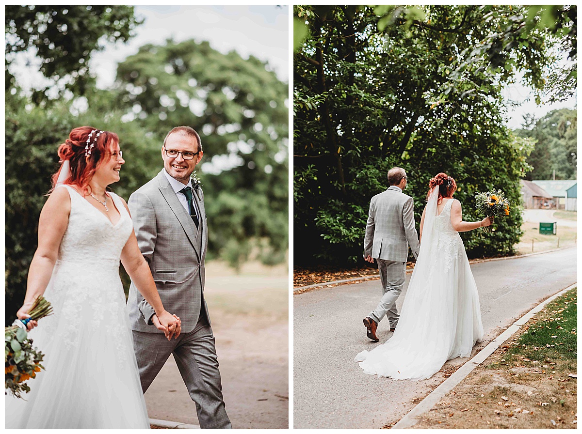 a married couple walking hand in hand after their wedding at the post barn newbury