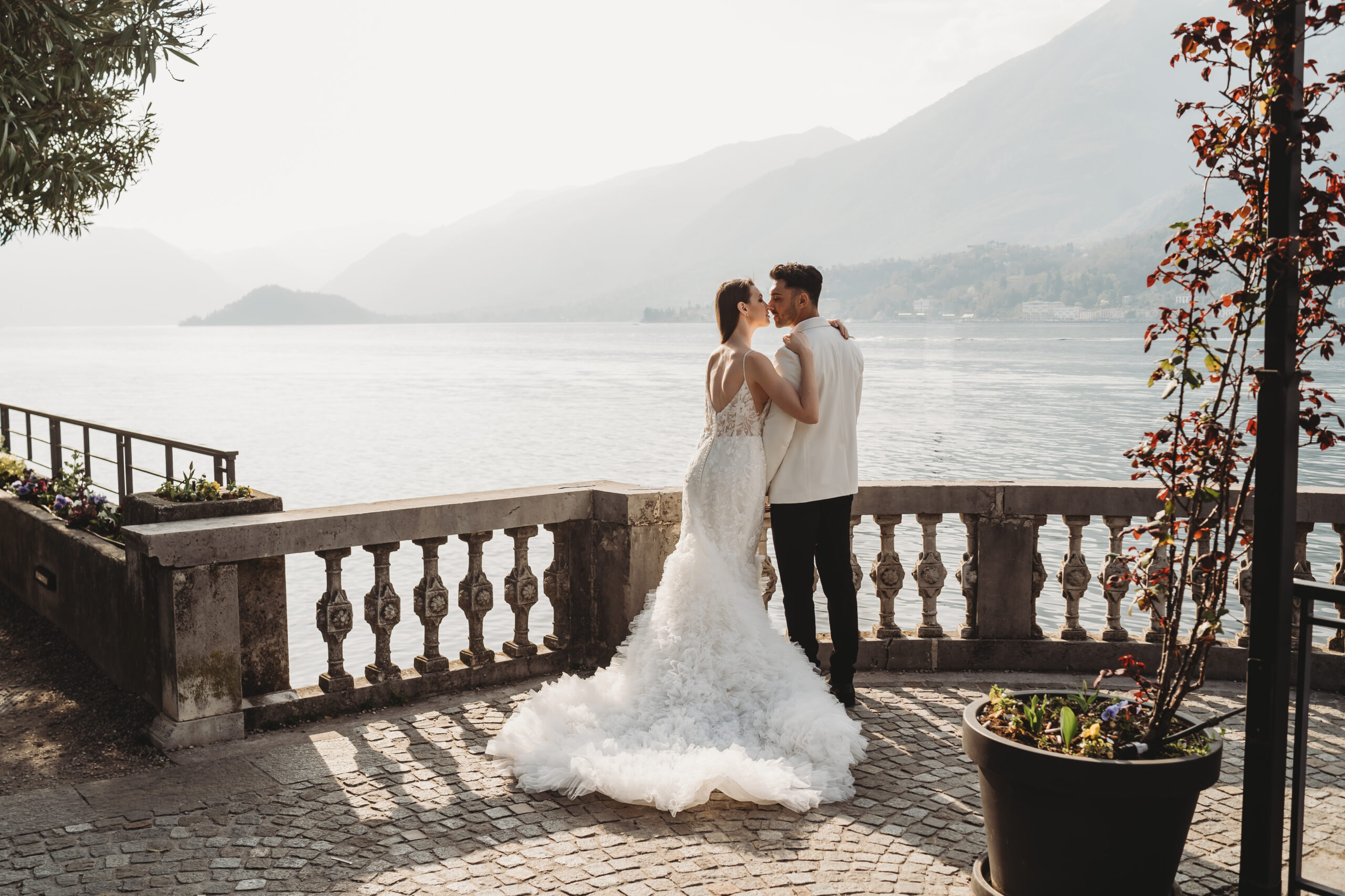 a newly wed couple cuddling after their romantic wedding in Italy