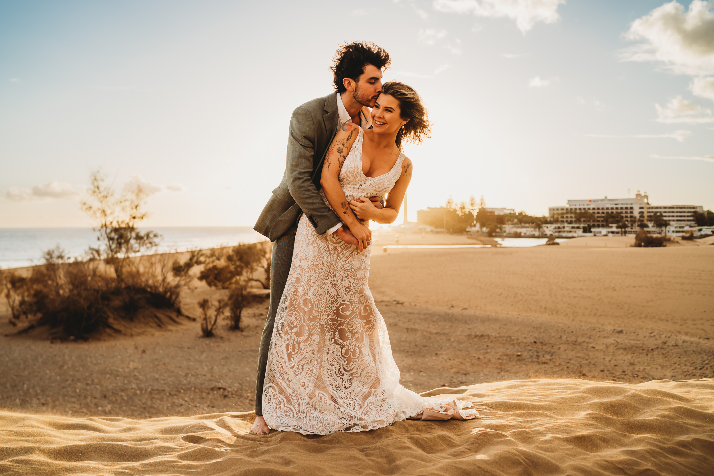 Husband and wide cuddling after their Gran Canaria elopement, captured by their Gran Canaria wedding photographer