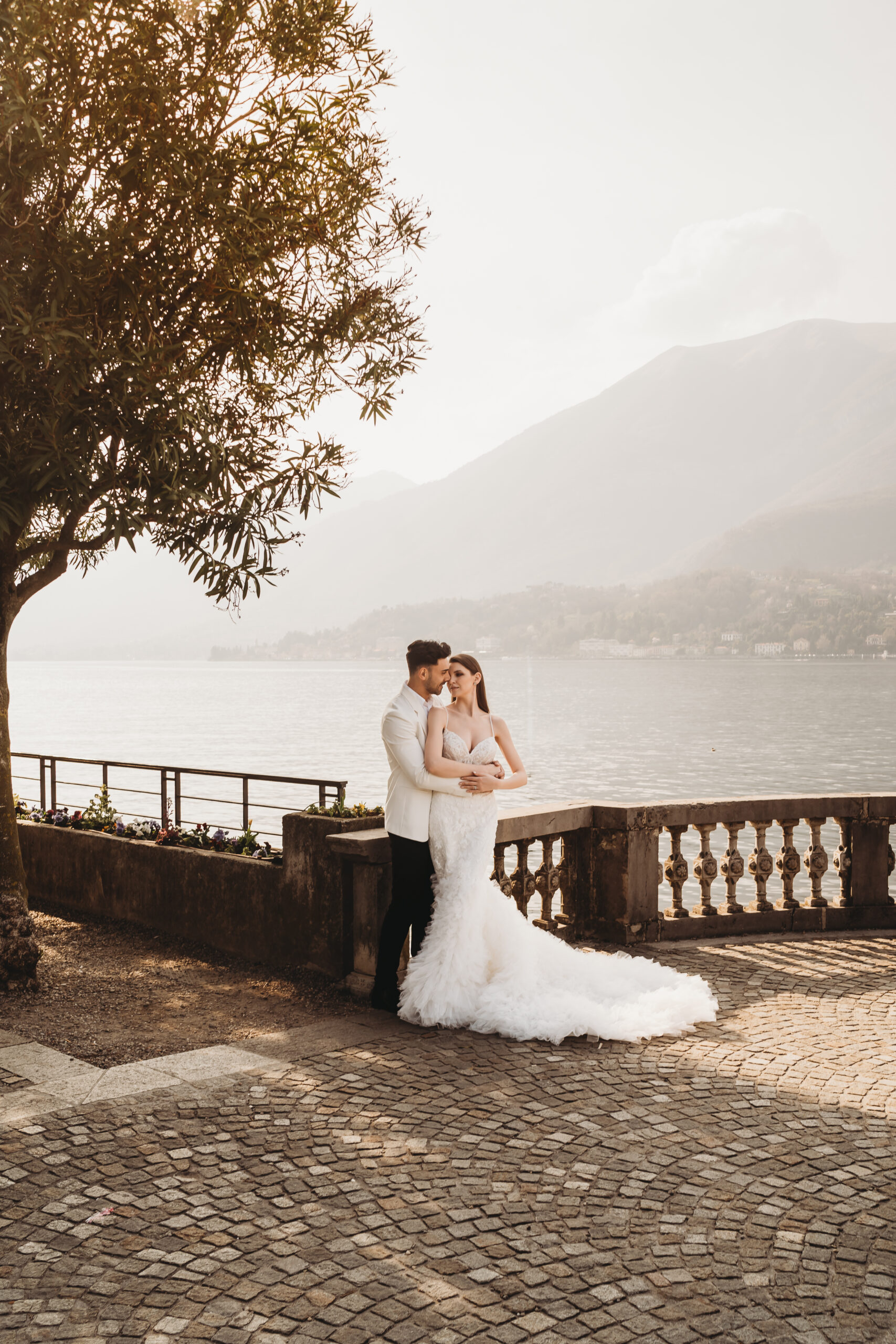 a bride and groom hugging after their intimate lake como elopement
