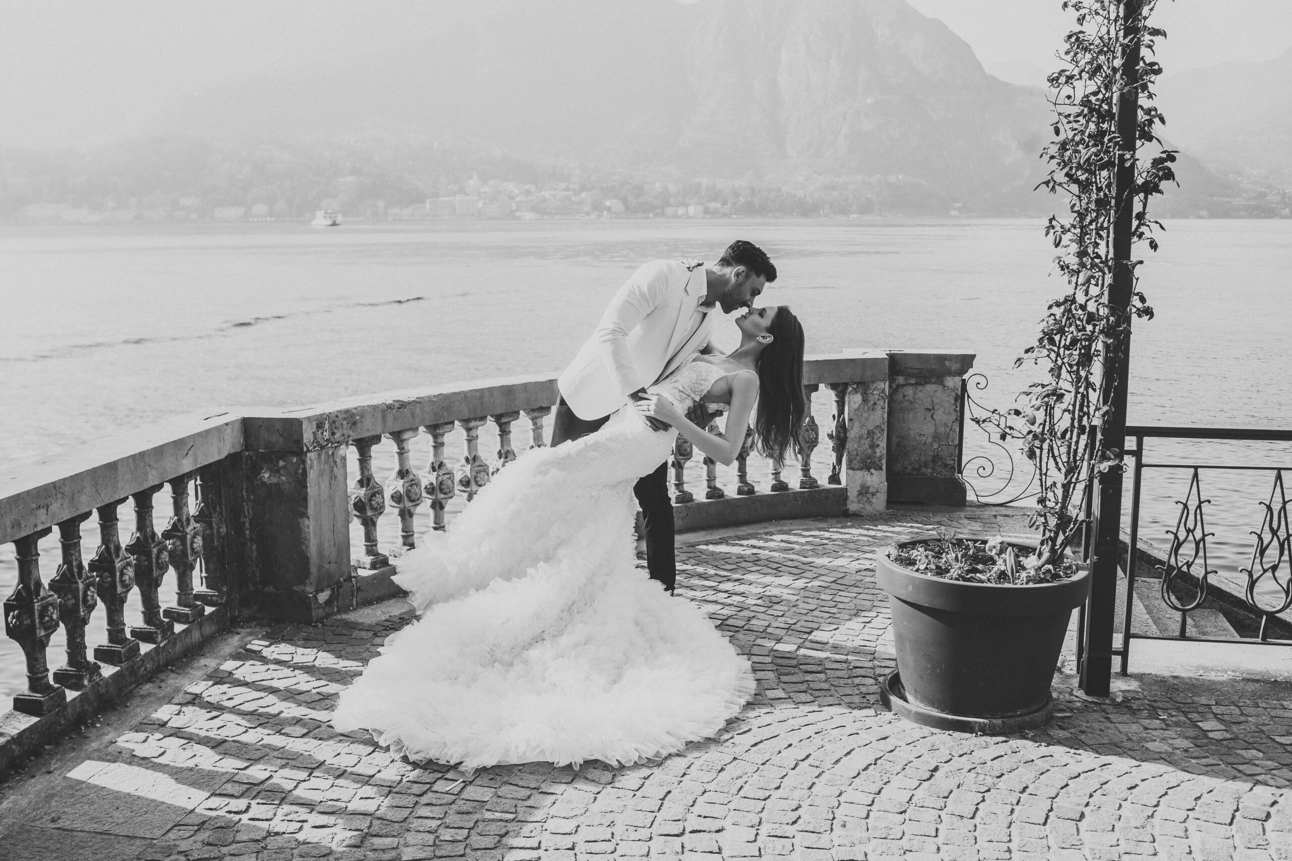 a newly wed couple almost kissing for a lake como wedding photographer