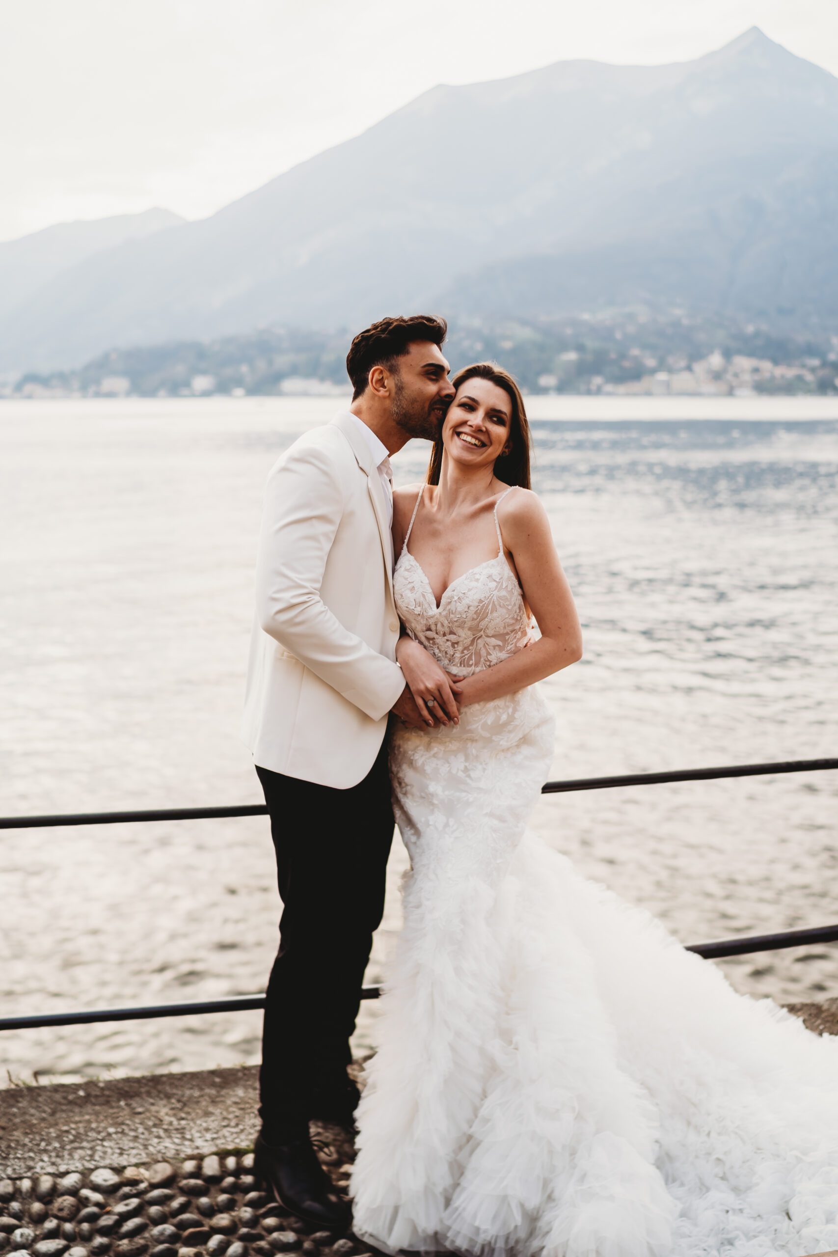 a bride and groom posing for a destination wedding photographer 