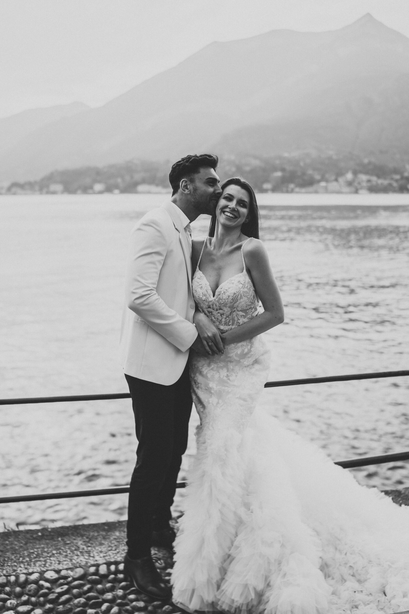 a bride and groom posing for a destination elopement photographer 