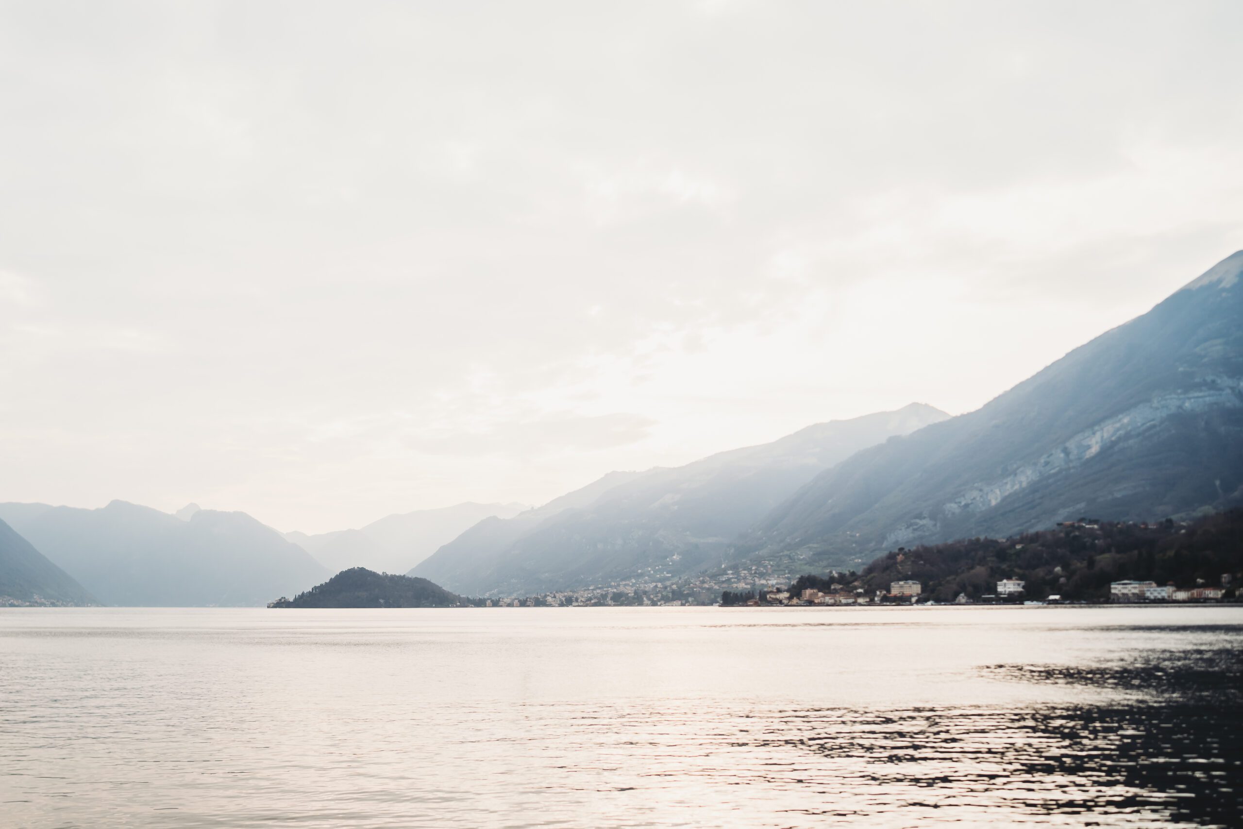 a panoramic view of the lake mountain ranges