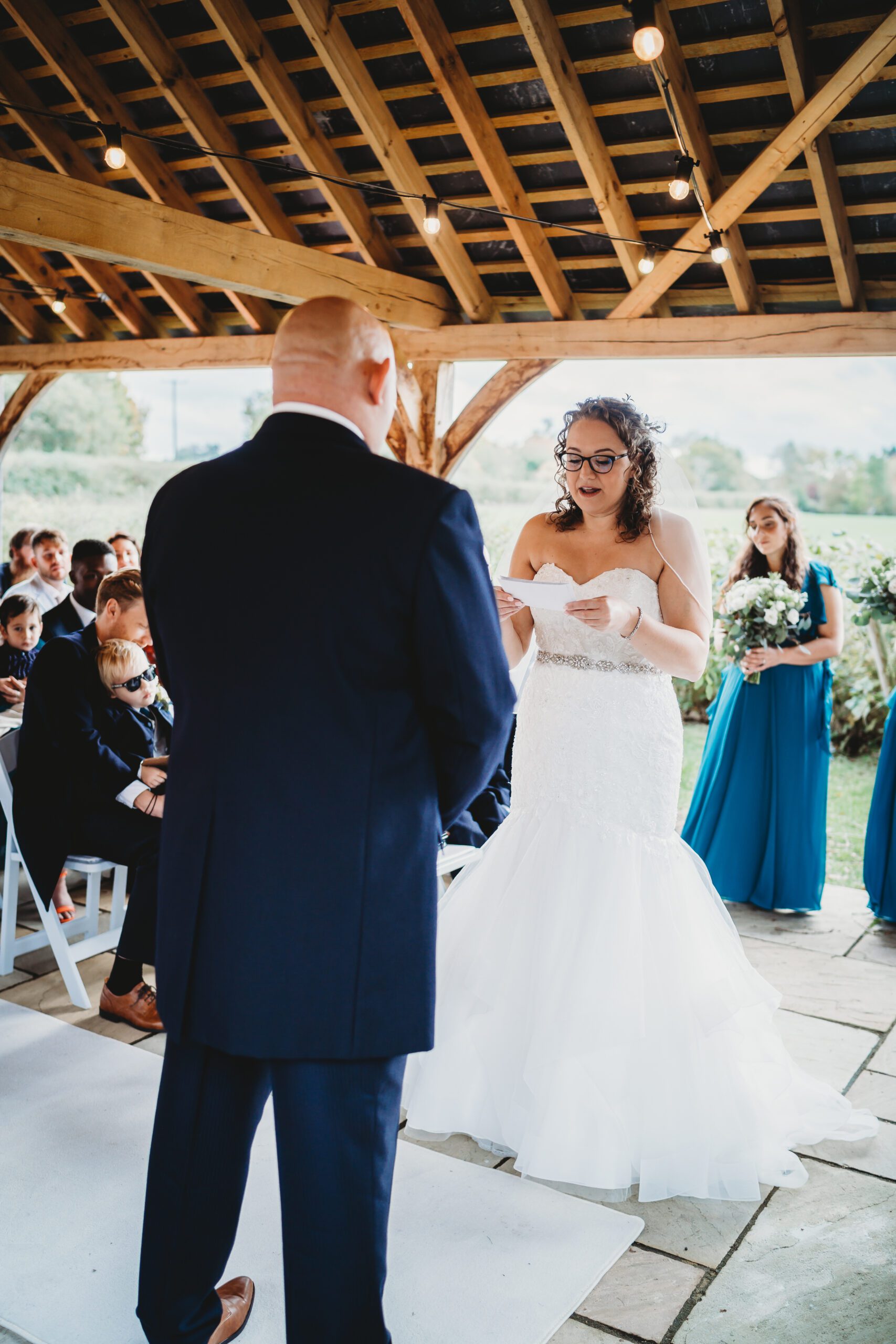 a bride reading her vows to her soon to be husband during a wedding taken by a hampshire wedding photographer 