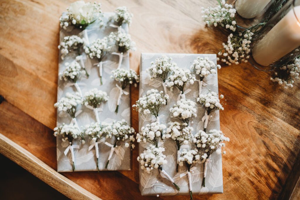 the button holes lined up before the wedding ceremony taken by a newbury wedding photographer 