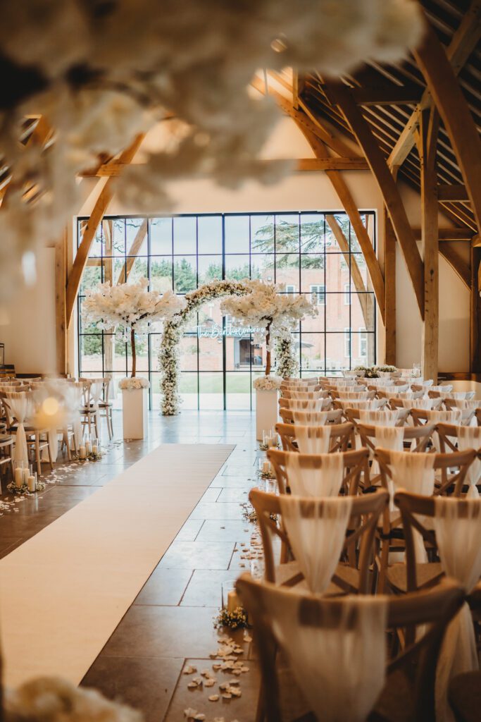 The Post Barn Newbury ready for an indoor white ceremony taken by a wedding photographer 