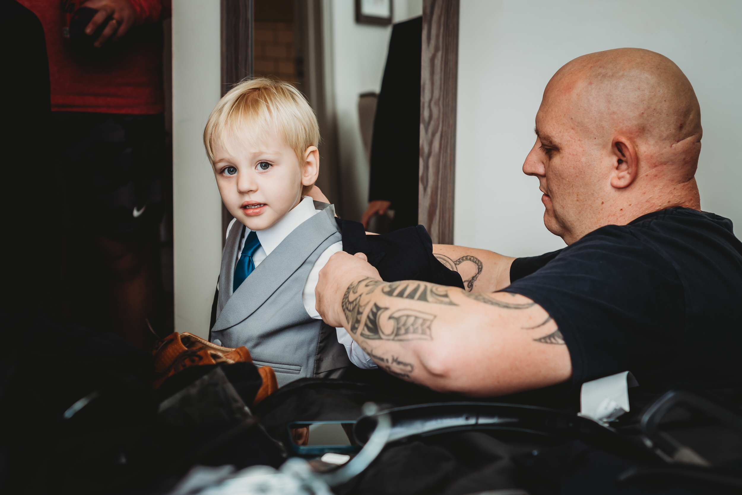 a page boy getting ready for his Dads wedding at The Wellington Arms