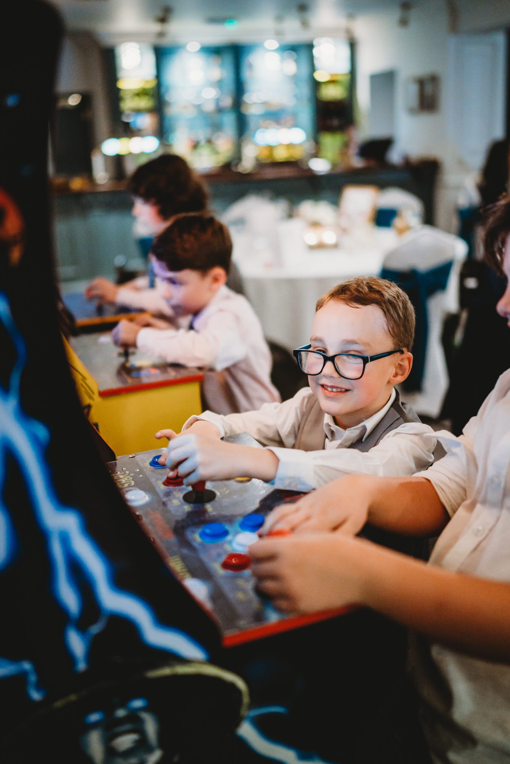 children playing retro video games during a wedding 