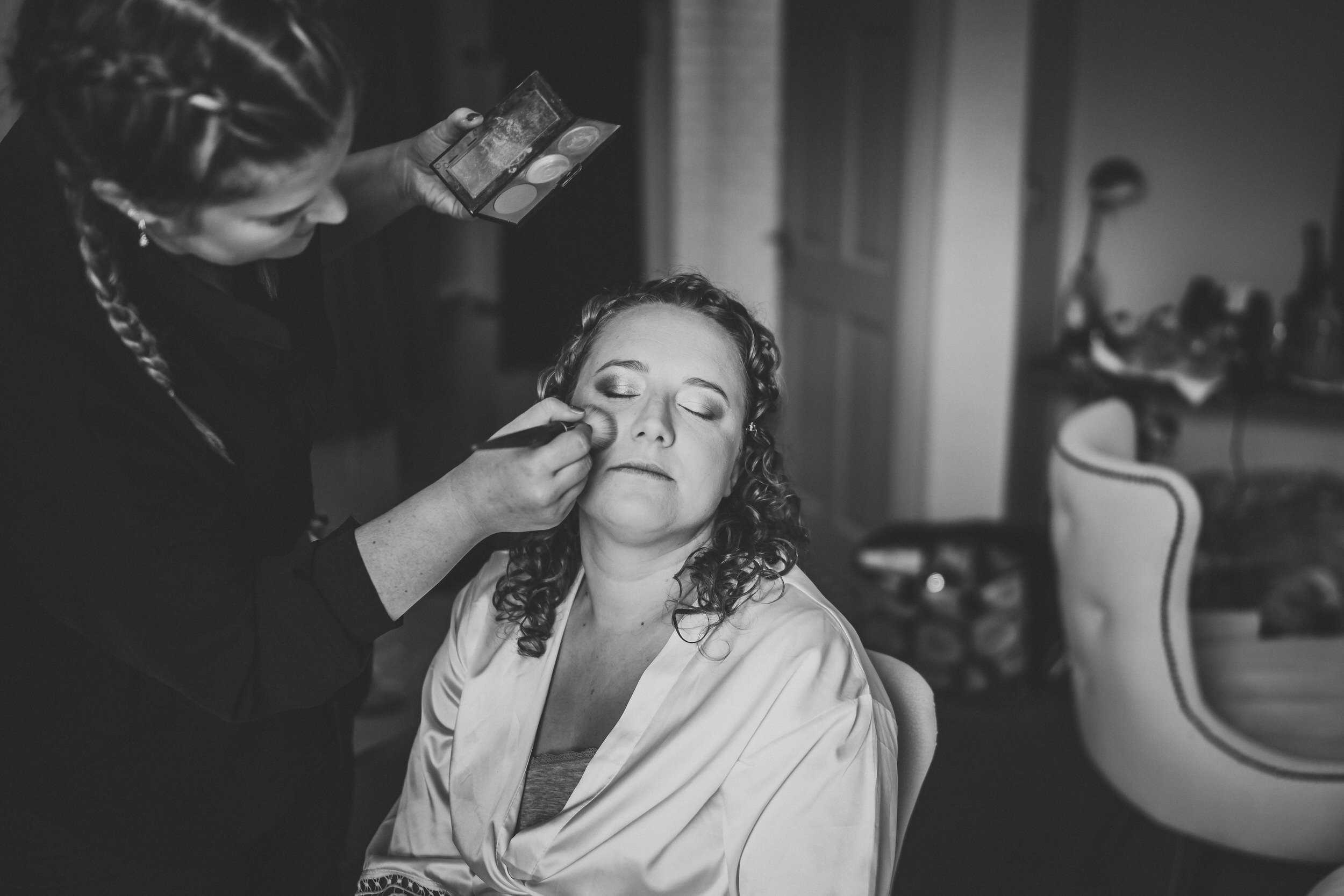 Final touches of a brides make up for the ceremony