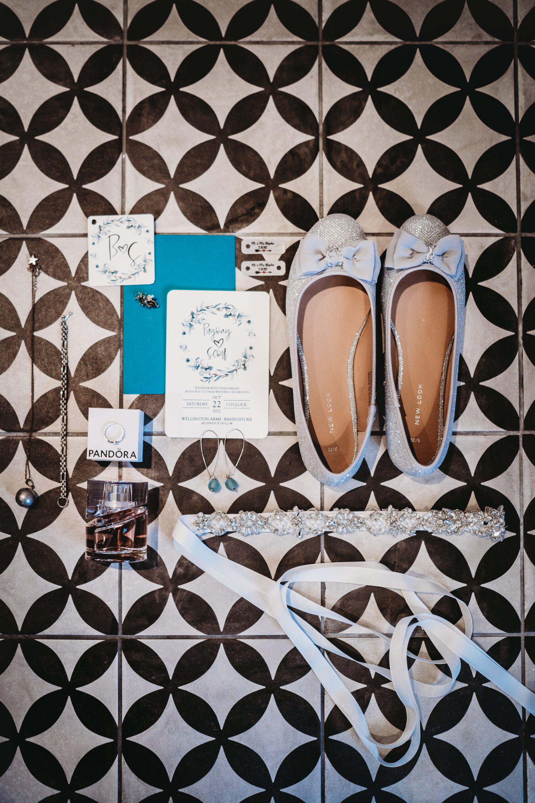 an ariel flat lay image of a brides special items for the wedding day