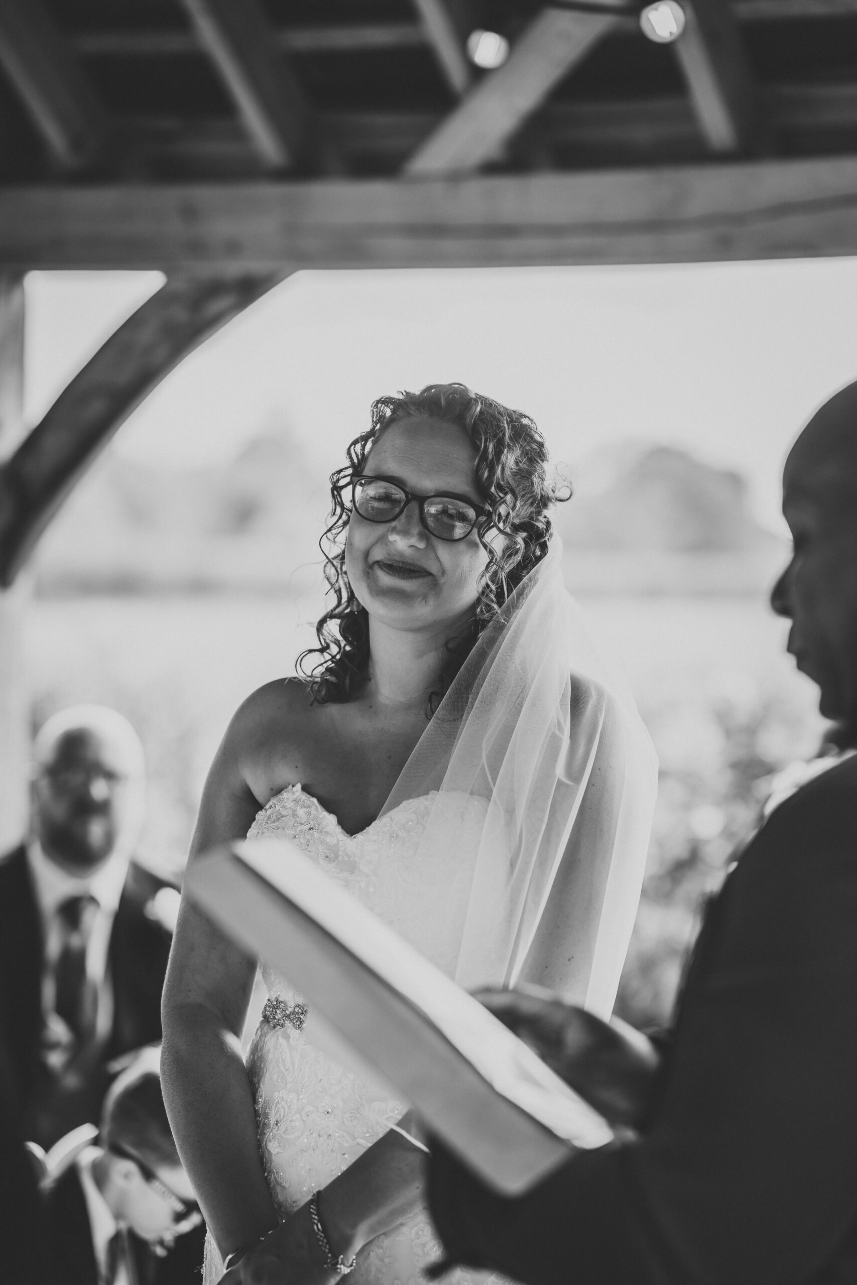 a bride looking at her celebrant during her autumn wedding