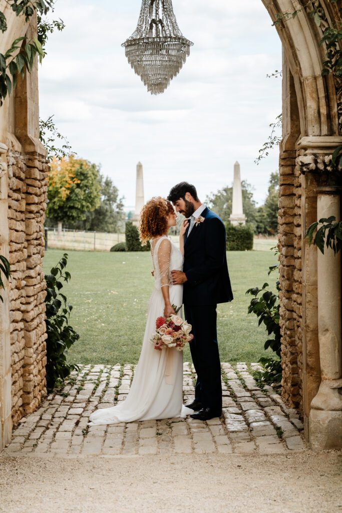 a bride and groom cuddling together after their wedding at euridge manor 