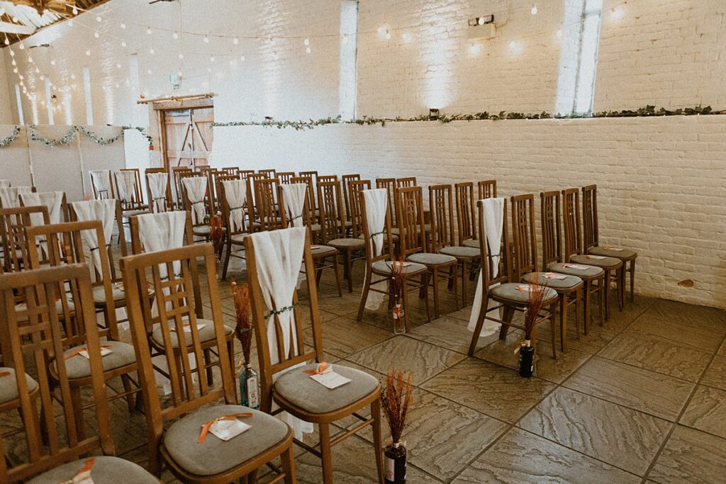 decorated ceremony room at Ufton Courts barn ready for a luxury wedding