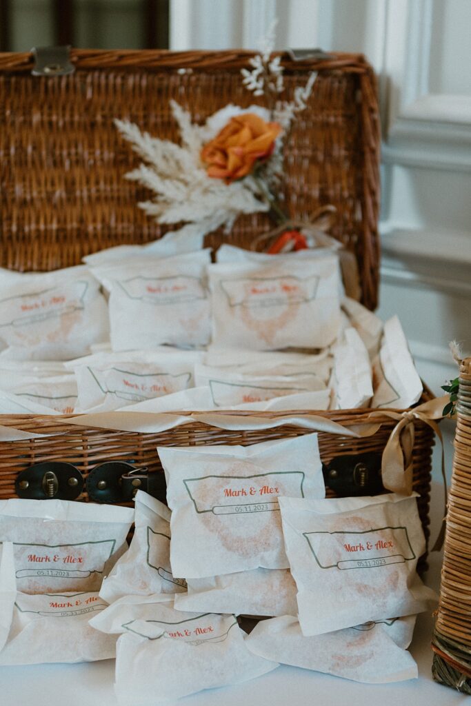 donuts bagged up and in a basket for wedding guests to help themselves to