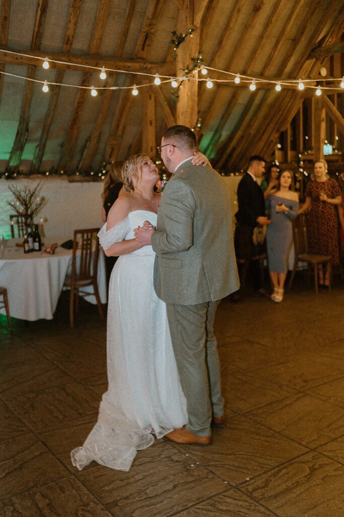 newly weds having their first dance at the barn at Ufton Court