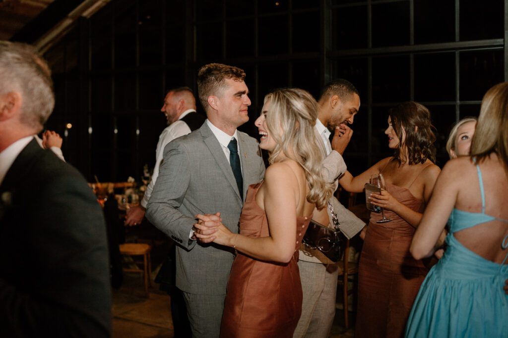 a couple dancing together during a wedding reception in Surrey