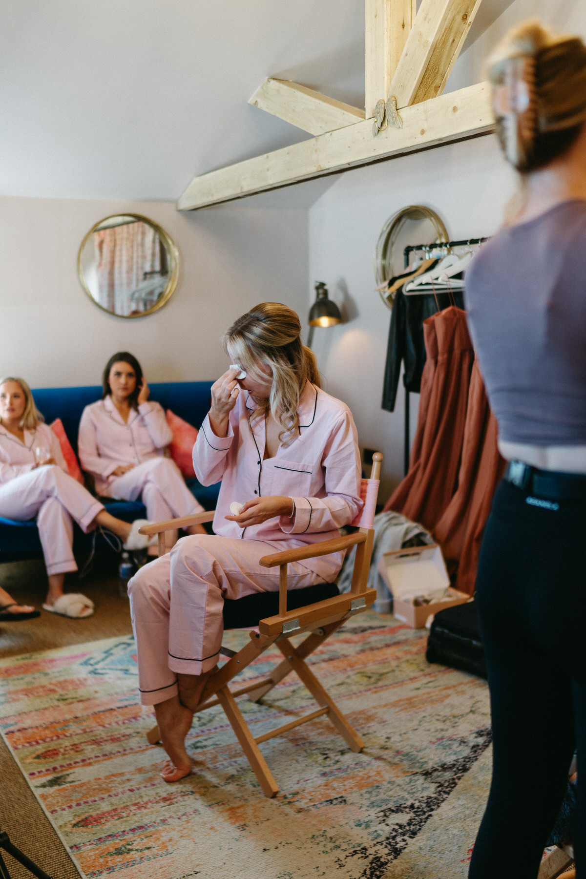 a bridesmaid getting emotional during bridal prep at a surrey wedding venue, Botley Hill Barn