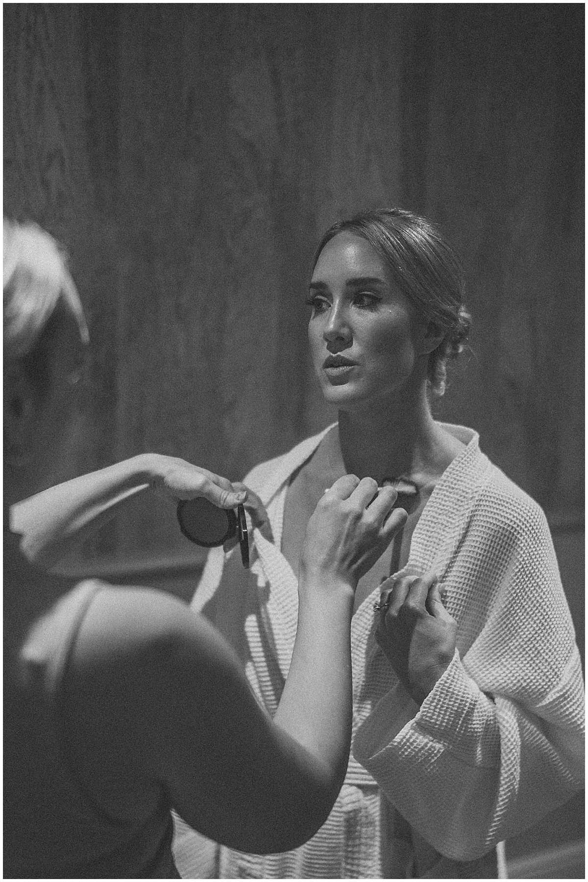 Final make up touch ups for a bride before her wedding ceremony