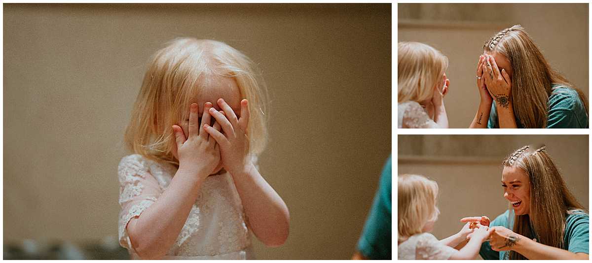 a flower girl playing peek a boo during wedding bridal prep